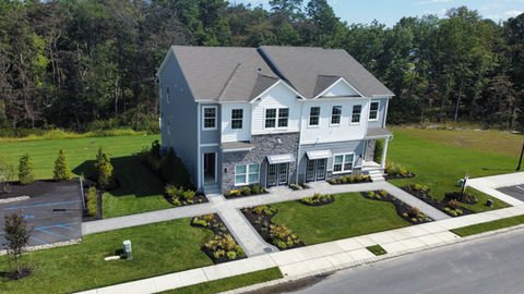 Aerial view of modern gray and commercial white duplex and green lawns. | Down To Earth Landscaping | Jackson New Jersey, USA (732) 833-7702