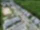 Aerial view new housing development, multiple homes, playground, and green forest. | Down To Earth Landscaping | Jackson New Jersey, USA (732) 833-7702