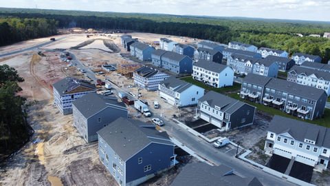 Aerial view of new housing development, many grey townhomes under construction. | Down To Earth Landscaping | Jackson New Jersey, USA (732) 833-7702